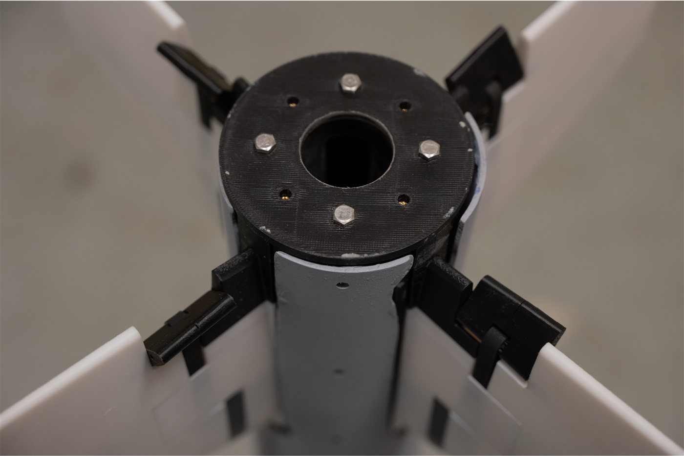Close-up of the aft hub with fin tabs mounted on all four fins