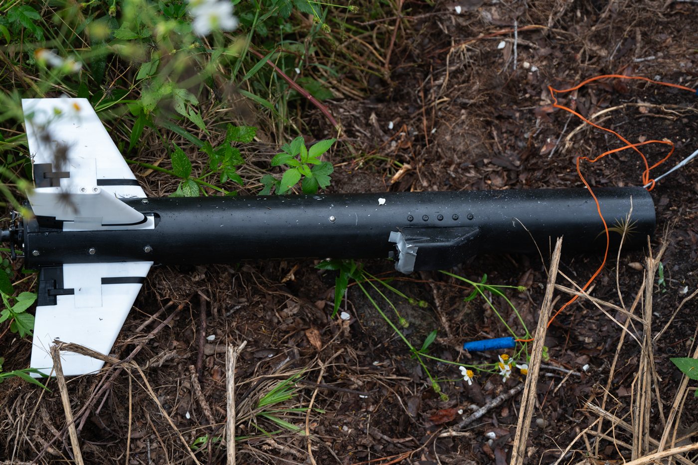 Moonfall&rsquo;s airframe lying in the brush after recovery
